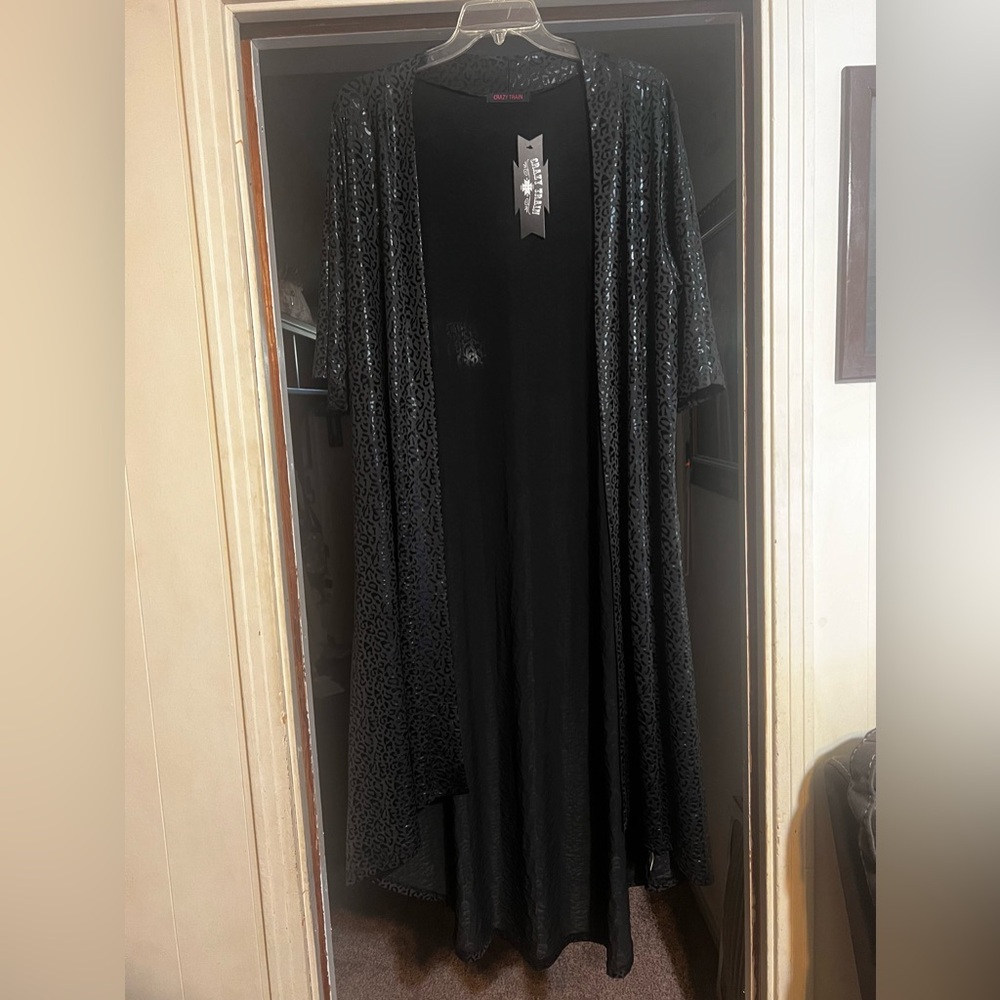 Sz: One Size
Crazy Train
Black w/Leopard Imprint 
NWT